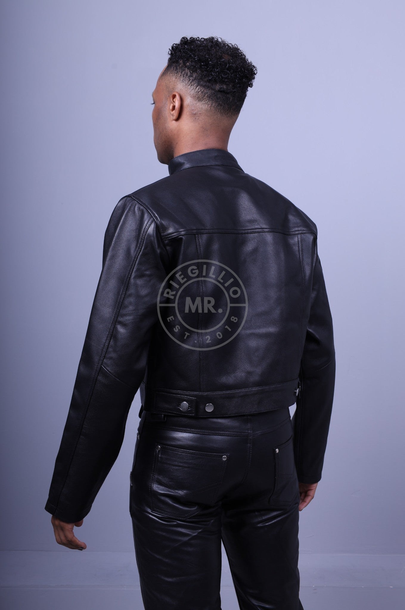 Black Leather Trucker Full Sleeve Cropped Jacket at MR. Riegillio