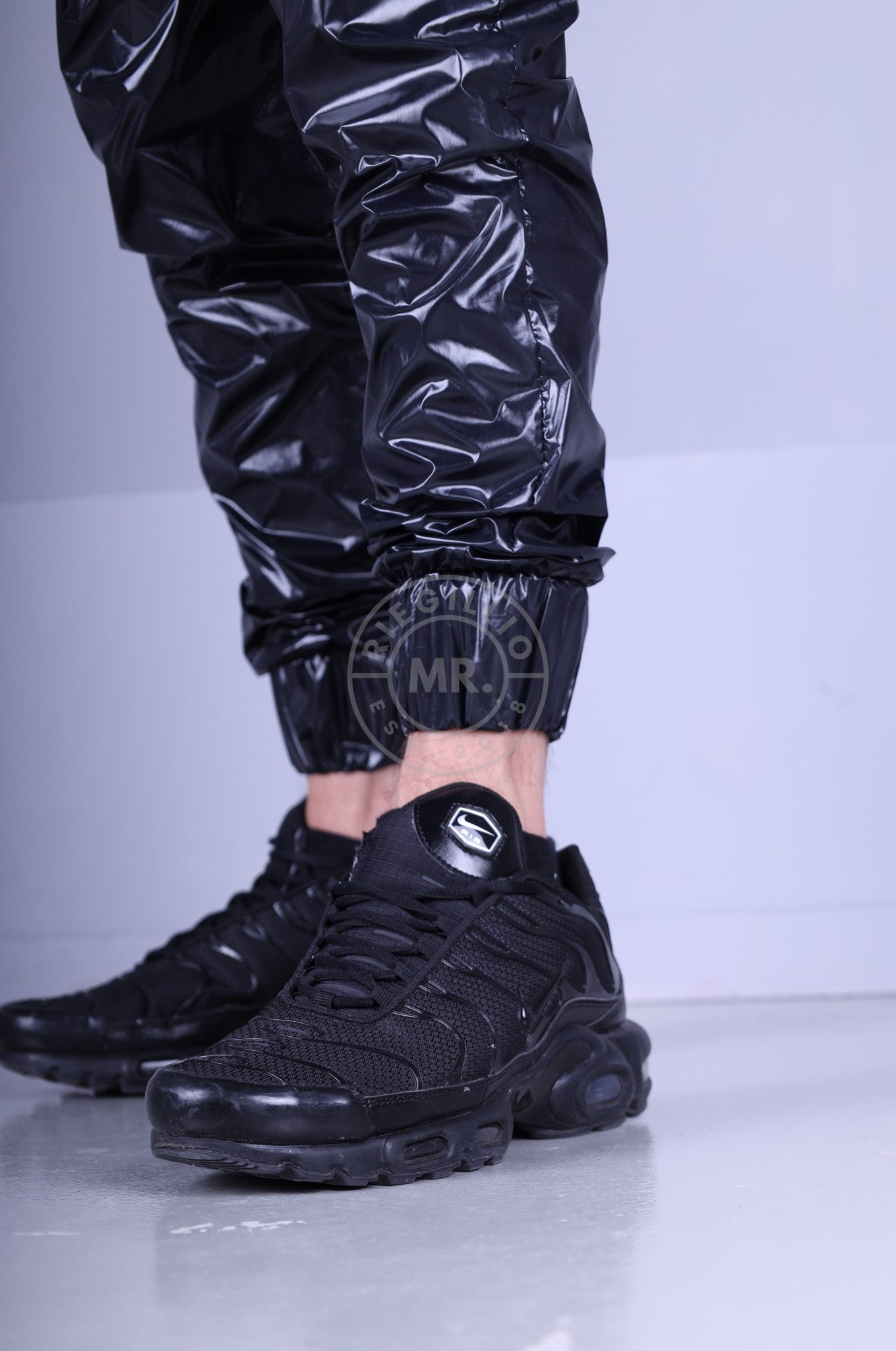 Full Black Shiny Nylon Tracksuit Pants at MR. Riegillio