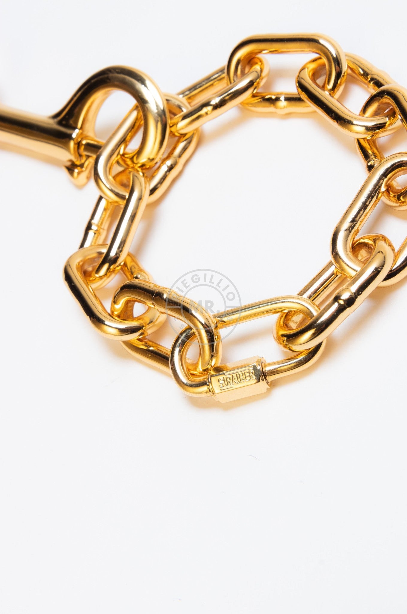 SIRAINER Chain Cuffs - Gold at MR. Riegillio