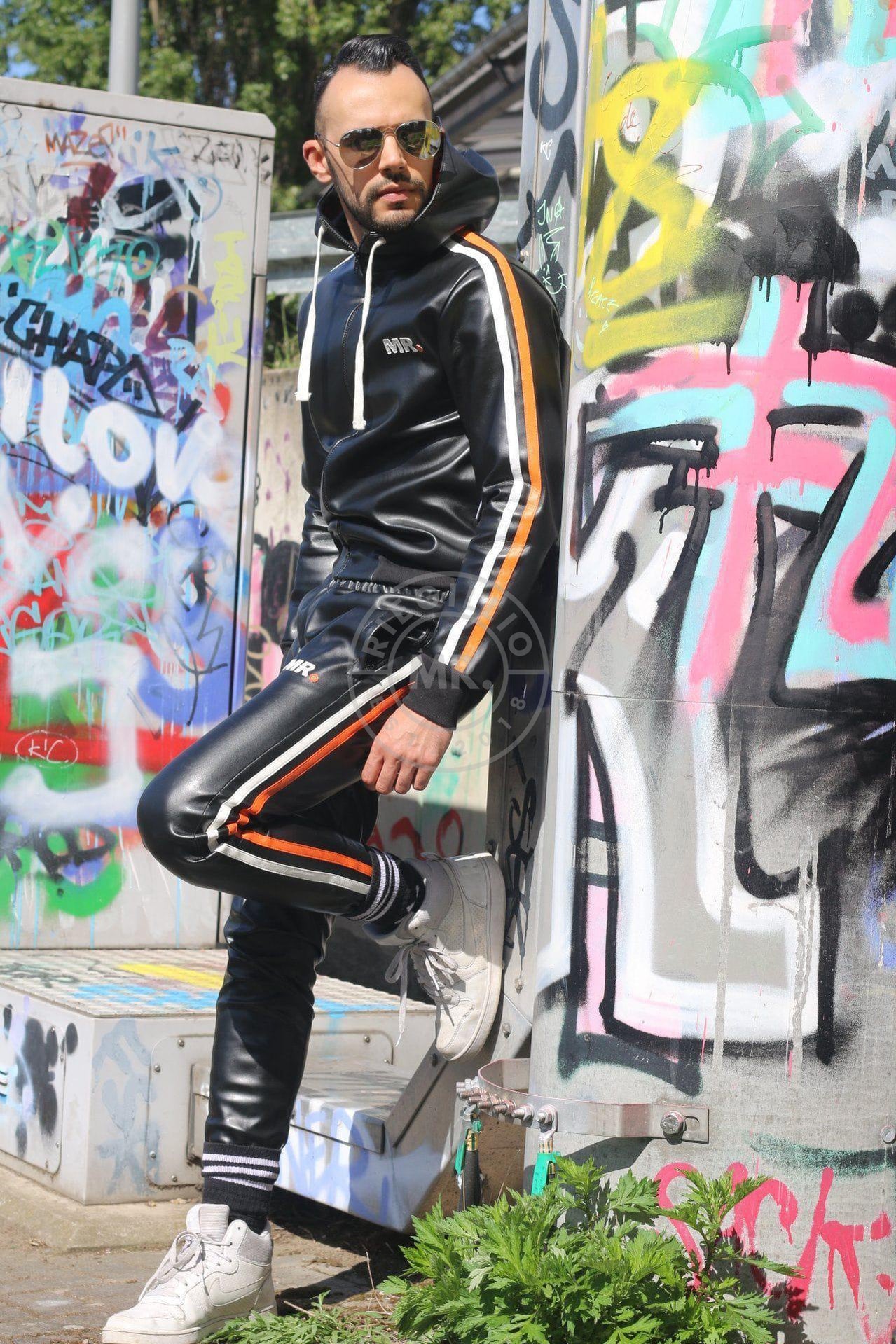 Leather jacket discount and track pants