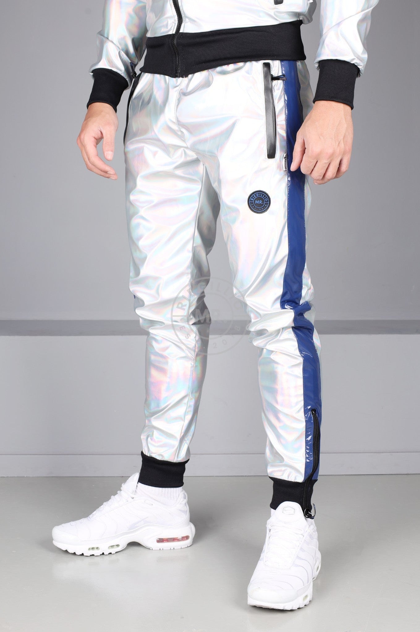 #001 Holographic PVC Tracksuit Pants at MR. Riegillio