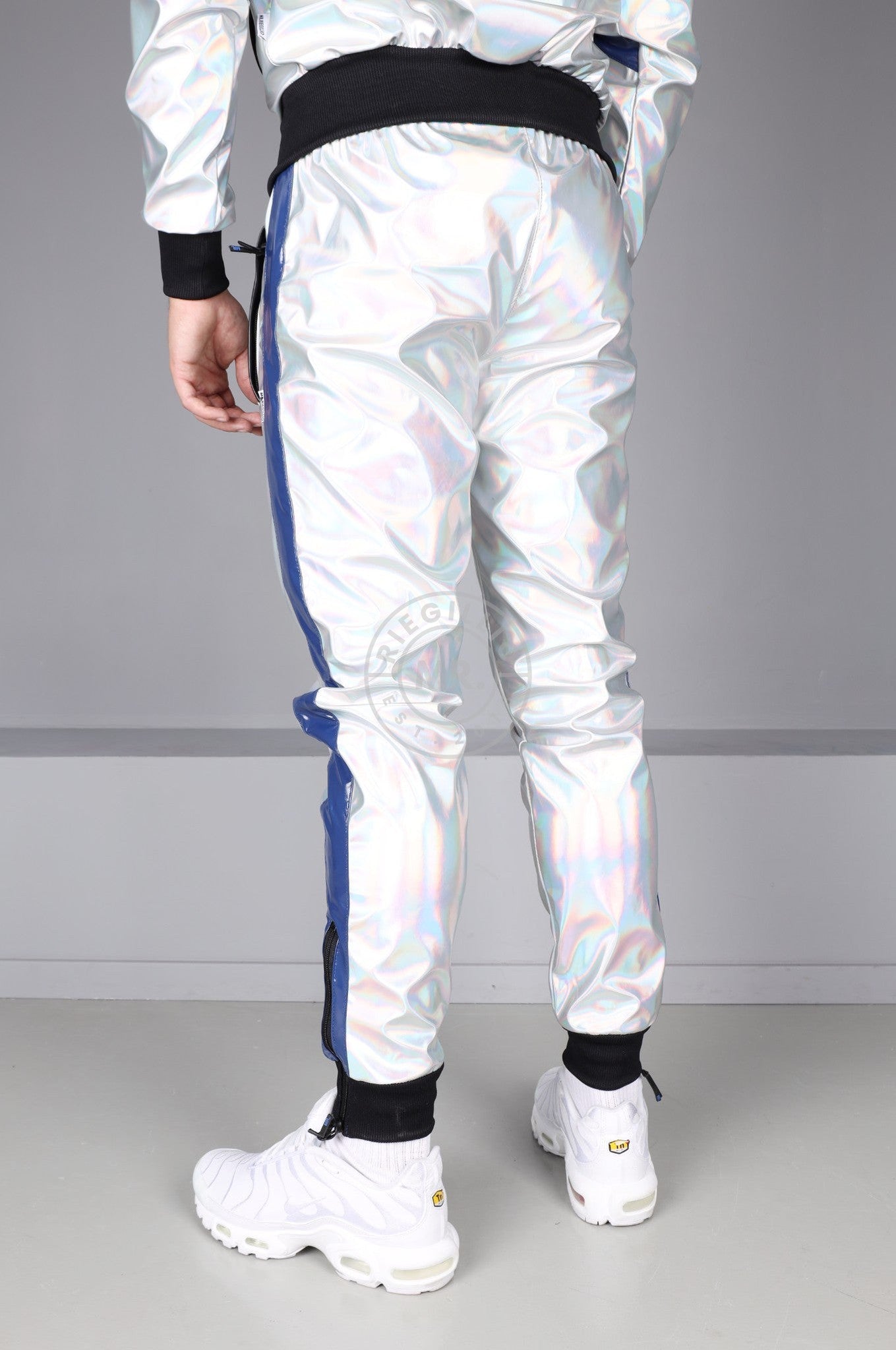 #001 Holographic PVC Tracksuit Pants at MR. Riegillio